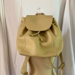 Cream colored Coach backpack